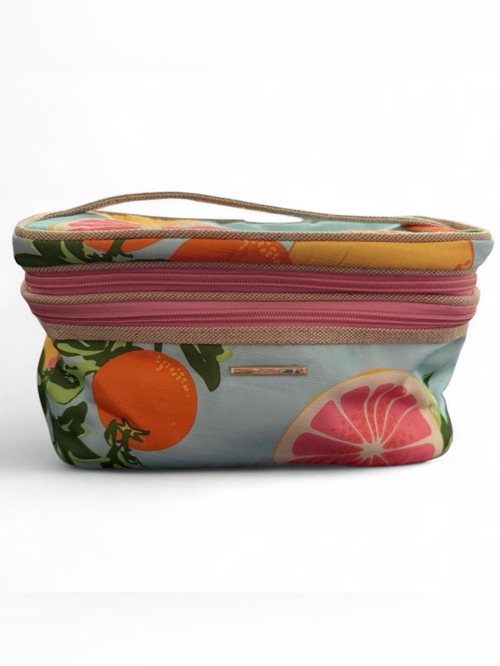TRINA citrus print makeup train case.Very clean. Special compartment for brushes